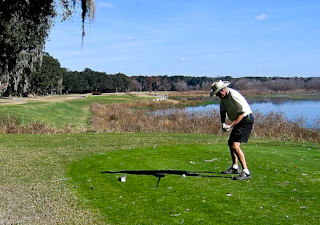 Golfers getting ready to go at Southern Oaks